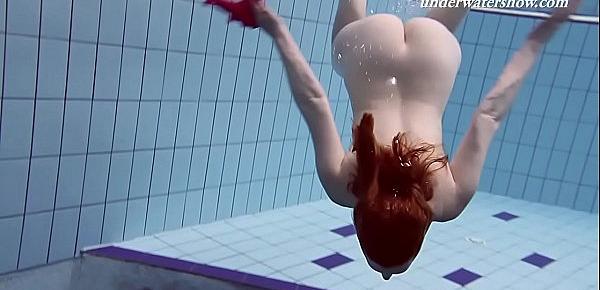  Underwater swimming teenie Lenka gets naked